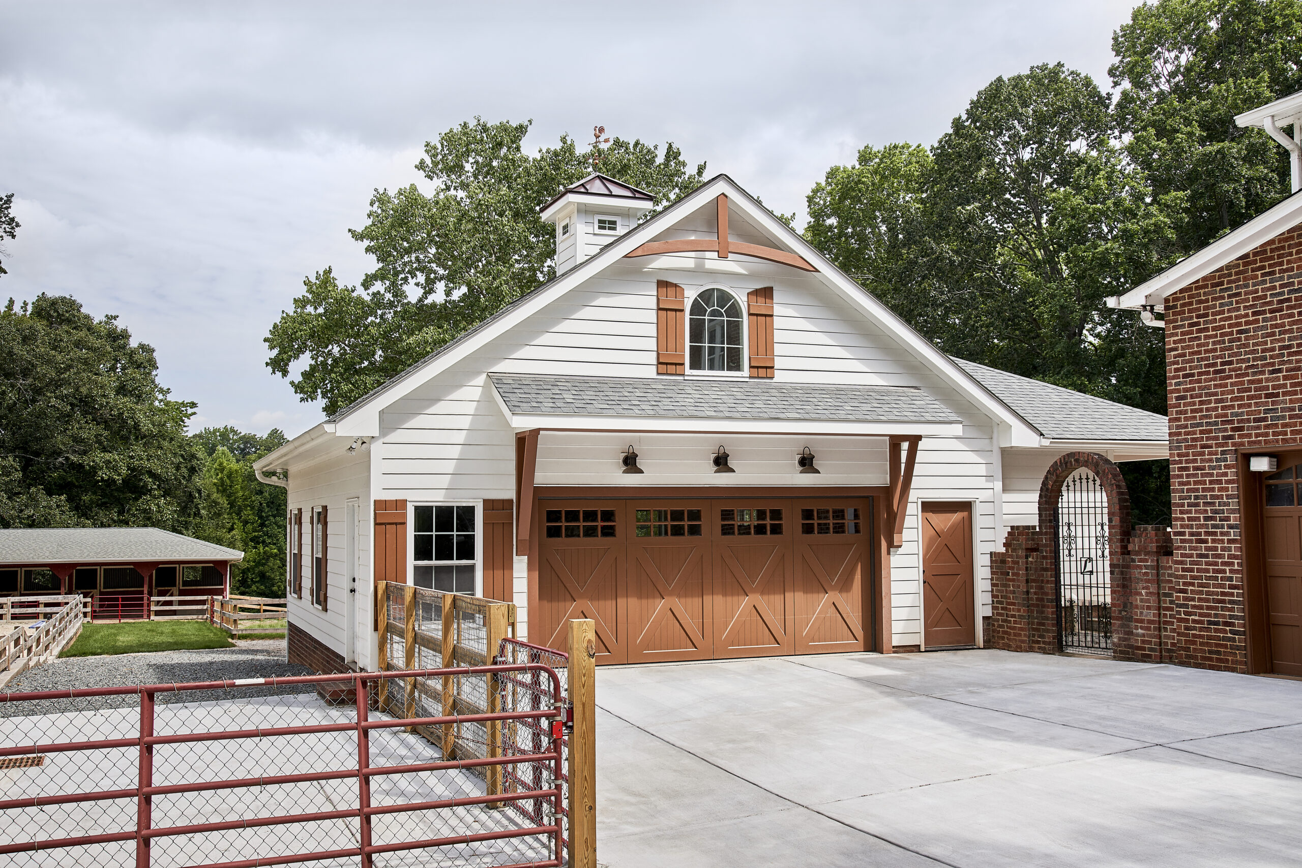 White and brown 2 car garage addition