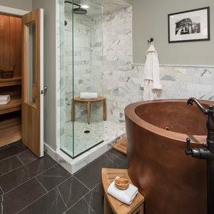 Bthroom remodel with round wooden soaking tub.