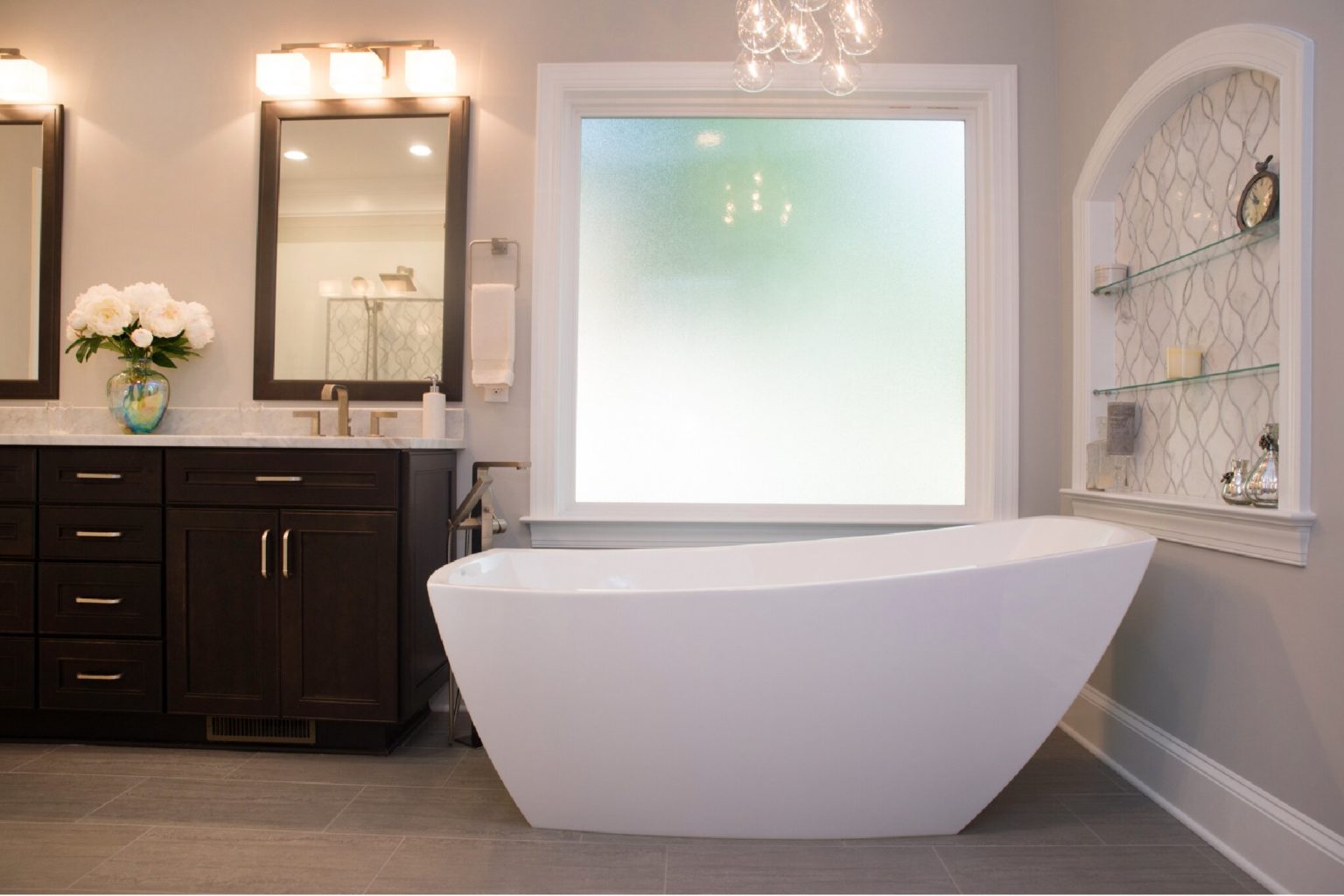 Bathroom remodel with large window and luxurious free-standing soaking tub