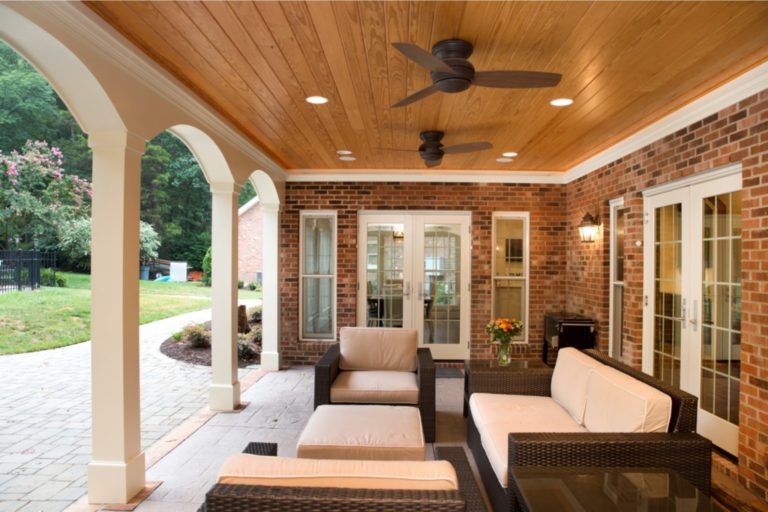 Covered patio remodel with spotlights in a wooden ceiling