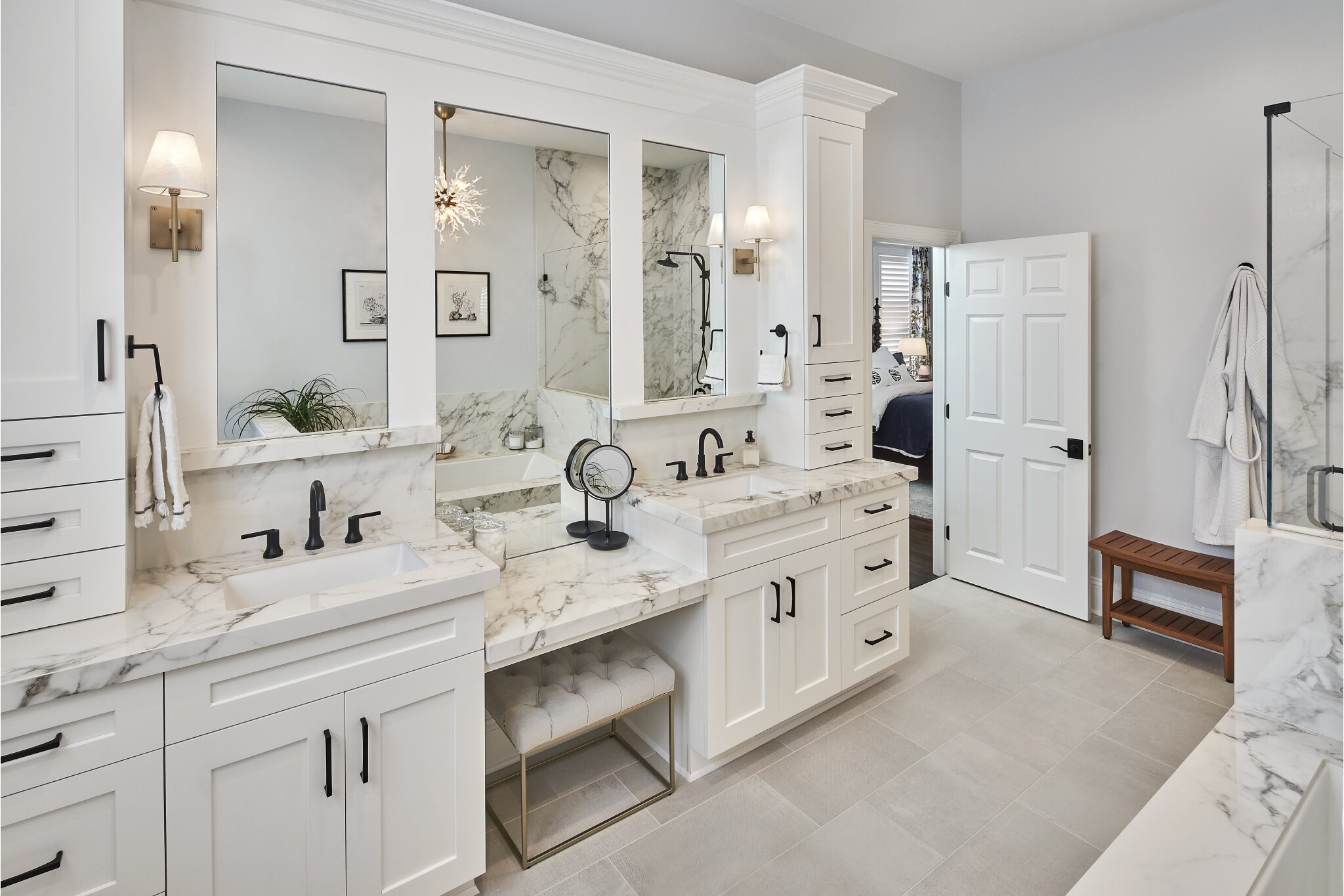 Master bathroom remodel with a his and hers sink made of white marble