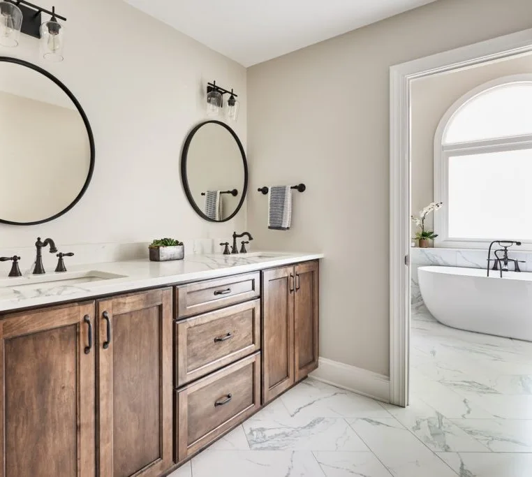 modern bathroom renovation stone tile flooring double sink and mirror vanity granite countertops